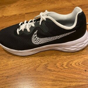 Women's Nike Sneaker size 9 Zebra emblem